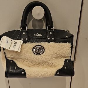 Coach Black and Cream Shearling Clutch
